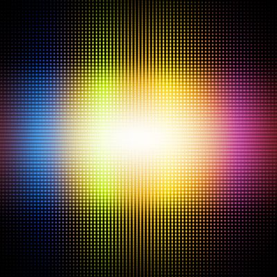 Blue, yellow, orange, and red dots with a bright white center on a black background