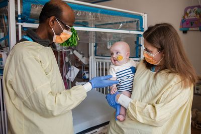 Drs. Kiran Musunuru and Rebecca Ahrens-Nicklas with patient KJ.