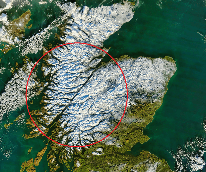 The Great Glen Fault, highlighted with a red circle, shown on a satellite image of snow-capped Scotland.
