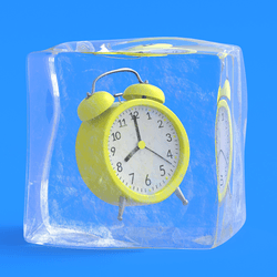 Yellow alarm clock suspended in a cube of ice on a blue background